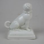 A Bow porcelain model of a Pug, c1760, seated looking to destra, with belled collar, on plinth base,