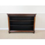 A 19th Century rosewood Open Bookcase, the rectangular moulded top above a drop frieze and