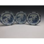 Three 18th Century blue and white octagonal Plates with landscape scenes, buildings, trees and