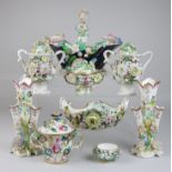 A collection of Coalbrookdale-type floral encrusted Porcelain, comprising two baskets, pair of spill