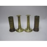 A pair of 18th Century brass trumpet Candlesticks with reeded bands, 6 1/4in, and a pair of brass