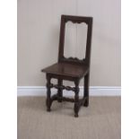 A late 17th Century French oak Child's Chair with open back, solid seat on turned and square front