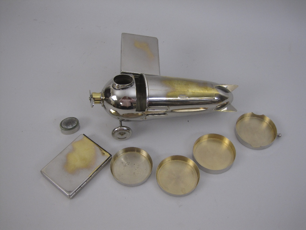 An unusual electroplated Novelty Aeroplane Smoker's Set, with match compartment and striker, - Image 4 of 11