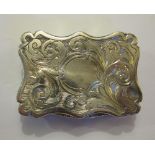 A Victorian silver shaped rectangular Vinaigrette with scroll engraving and vacant cartouche,