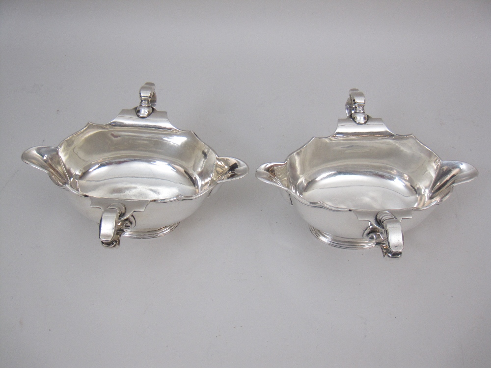 A pair of George V silver double lipped two handled Sauce Boats on oval bases, London 1934, maker: - Image 2 of 2