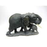 A large stone African Elephant with Calf, 18in, realistically carved by African village artist