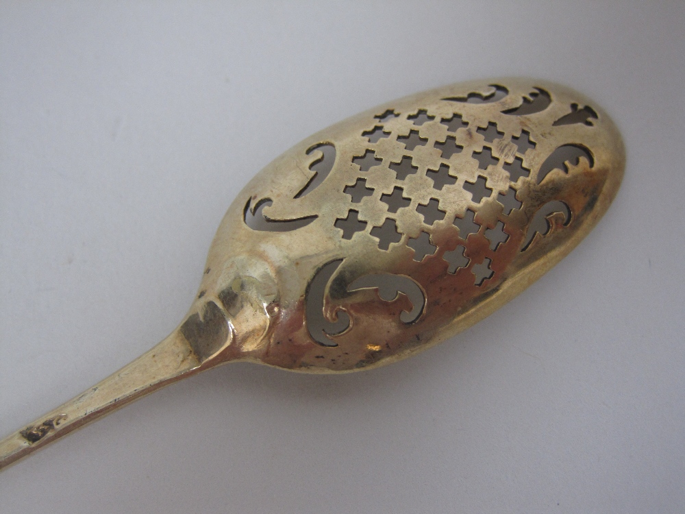 An 18th Century silver-gilt Mote Spoon with saltire cross and scroll piercing, engraved crest and - Image 3 of 5