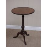 An 18th Century oak Pillar Table with circular top having shallow gallery on vase turned column with