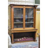 A 19th Century rosewood glazed Bookcase, the pair of glazed doors flanked by a pair of columns,