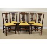 A set of six 19th Century fruitwood Dining Chairs with shaped top rails, pierced splats, yellow