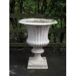 A white painted cast iron Garden Urn on square base