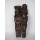 Two antique oak Pilasters carved bearded figure and cherub above mask, fruit and scrolls, approx