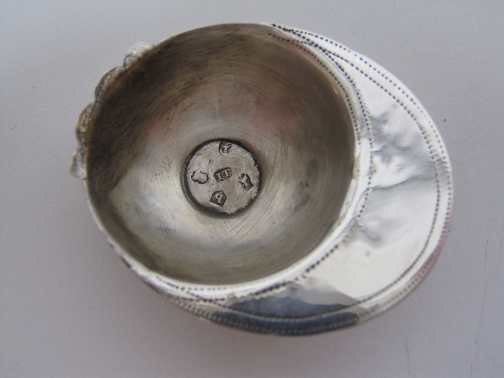 A George III silver Caddy Spoon in the form of a jockey's cap with leafage engraving and initial - Image 3 of 3