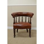 A 19th Century mahogany framed Library Chair with leather upholstered top rail and seat, spindle