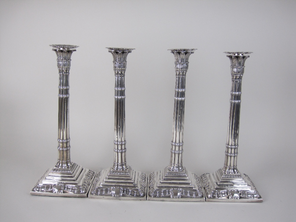 A Set of four George II silver Candlesticks with fluted columns having papyrus sconces, detachable - Image 2 of 3