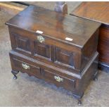 An 18th Century oak three panel Coffer Bach mounted upon cabriole supports and pad feet, 2ft 1in W x