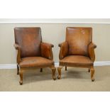 A pair of Georgian style Armchairs having scroll arms with rosette finials, with leather