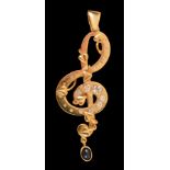 A Treble Clef Pendant set graduated brilliant-cut diamonds and embossed leaves, suspending drop