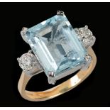 An Aquamarine and Diamond Ring corner claw-set step-cut aquamarine, 5.37cts, between two brilliant-