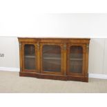 A Victorian walnut Credenza with three glazed doors and gilt metal mounts, 6ft W x 3ft 6in H