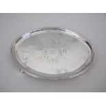 A George III silver oval Teapot Stand engraved coat of arms, London 1790, repaired