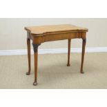 An early 18th Century walnut Card Table with cross-banded and herringbone inlaid shaped