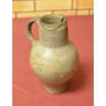 A Rheinish stoneware Flagon with reeded neck and loop handle, 10in