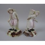 A pair of Belleek porcelain 'Belgian Hawker' Figures, first black mark, 7in, male restored