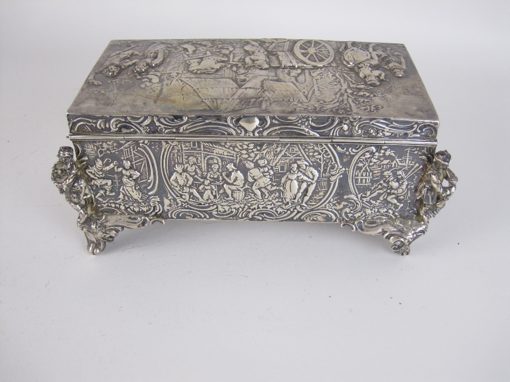 A Continental silver Casket embossed with figures merrymaking, cast figure musicians to the corners, - Image 3 of 5