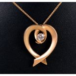 A Diamond heart shaped Pendant rub over set brilliant-cut stone, approx 0.30cts, in brushed gold