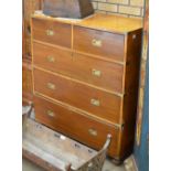 A 19th Century camphor wood Military Campaign Chest of two short and three long drawers on turned