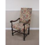 A Carolean walnut framed Elbow Chair with floral upholstered back and seat, scroll arms on