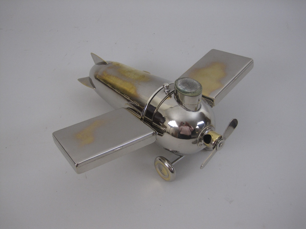 An unusual electroplated Novelty Aeroplane Smoker's Set, with match compartment and striker, - Image 10 of 11