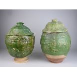 Two Chinese Han-style green glazed pottery Jars and Covers, moulded decoration, tallest 15 1/2 in H,