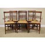 A set of six 19th Century elm Dining Chairs with horizontal rail backs with ball friezes, rush seats