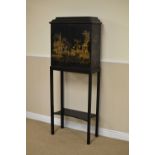 A 19th Century lacquered and gilt chinoiserie decorated Cabinet on Stand, the moulded cornice