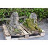 A pair of reconstituted stone Figures of Sphinxes on rectangular bases, 3ft 3in L