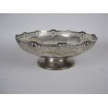 A George V silver circular Fruit Bowl with pierced rim, Birmingham 1931