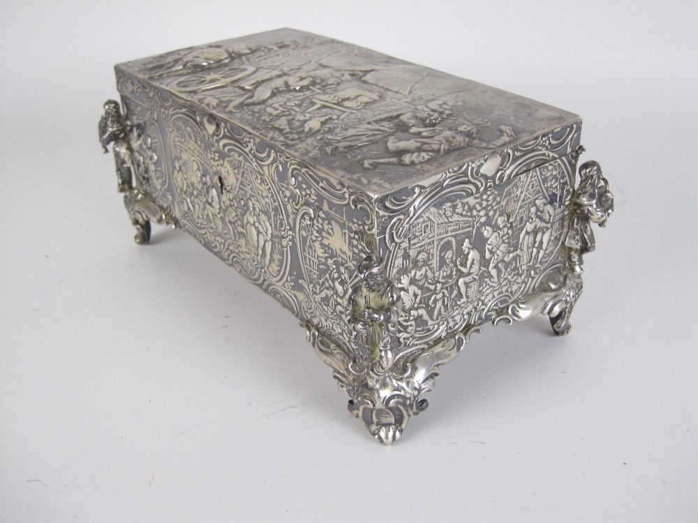 A Continental silver Casket embossed with figures merrymaking, cast figure musicians to the corners, - Image 2 of 5