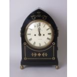 A Regency Bracket Clock with double fusee movement within arched ebonised case with brass inlay