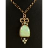 An Opal Pendant with ribbon surmount set seed pearls on 9ct gold chain