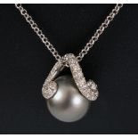 A Diamond and Grey Cultured Pearl Pendant, the scrolled mount pavé-set numerous brilliant-cut stones