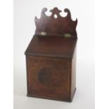 A 19th Century mahogany Candle Box with pierced and shaped top above sloping lid and satinwood