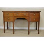 A Regency satinwood inlaid mahogany bow front Sideboard, the crossbanded top above a central