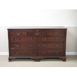 A Georgian mahogany Mule Chest with hinged top above dummy and four real drawers on ogee bracket