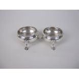 A pair of George III silver Cauldron Salts with beaded rims on hoof feet, London 1783