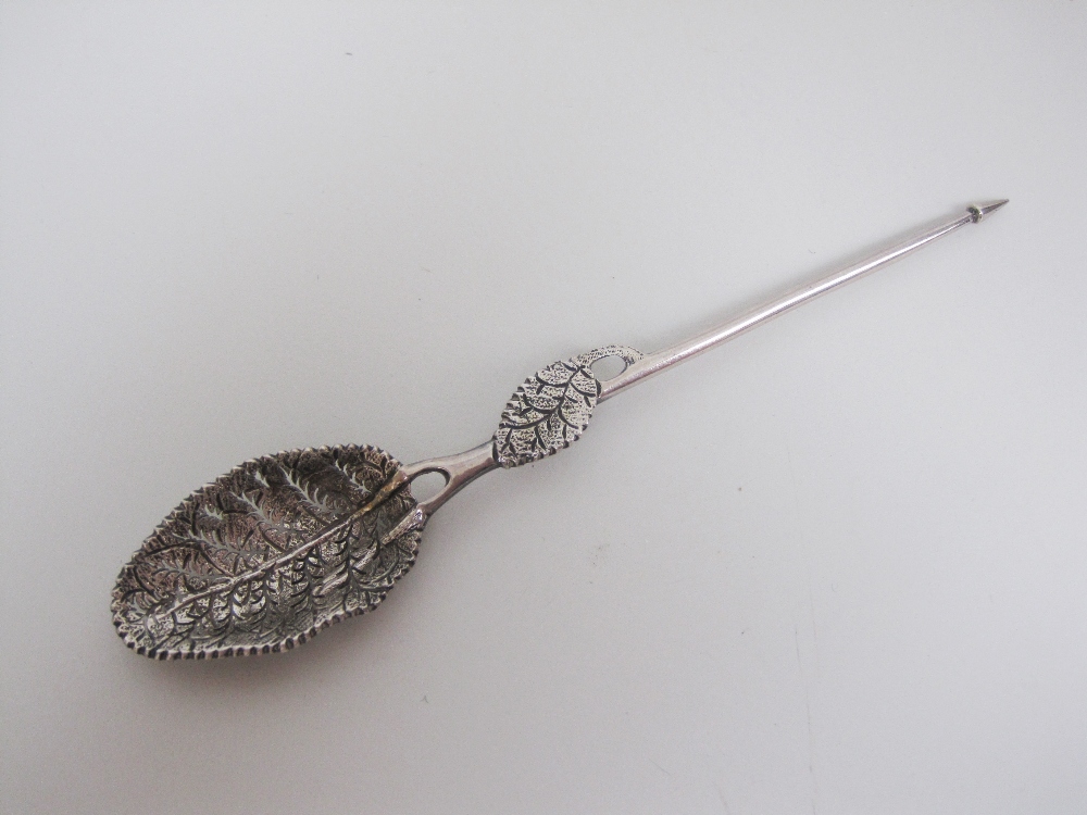 An 18th Century cast silver Mote Spoon, the bowl in the form of a pierced leaf