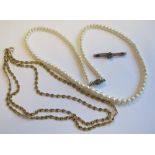 A double row fancy link Necklace, approx 25gms, a Bar Brooch set seed pearls and a single row of