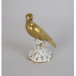 A Chamberlain Worcester Model of a Bird with gilt detail perched on a floral encrusted stump, 3in,