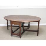An 18th Century elm Gateleg Table with oval top, shaped frieze on baluster turned and squared